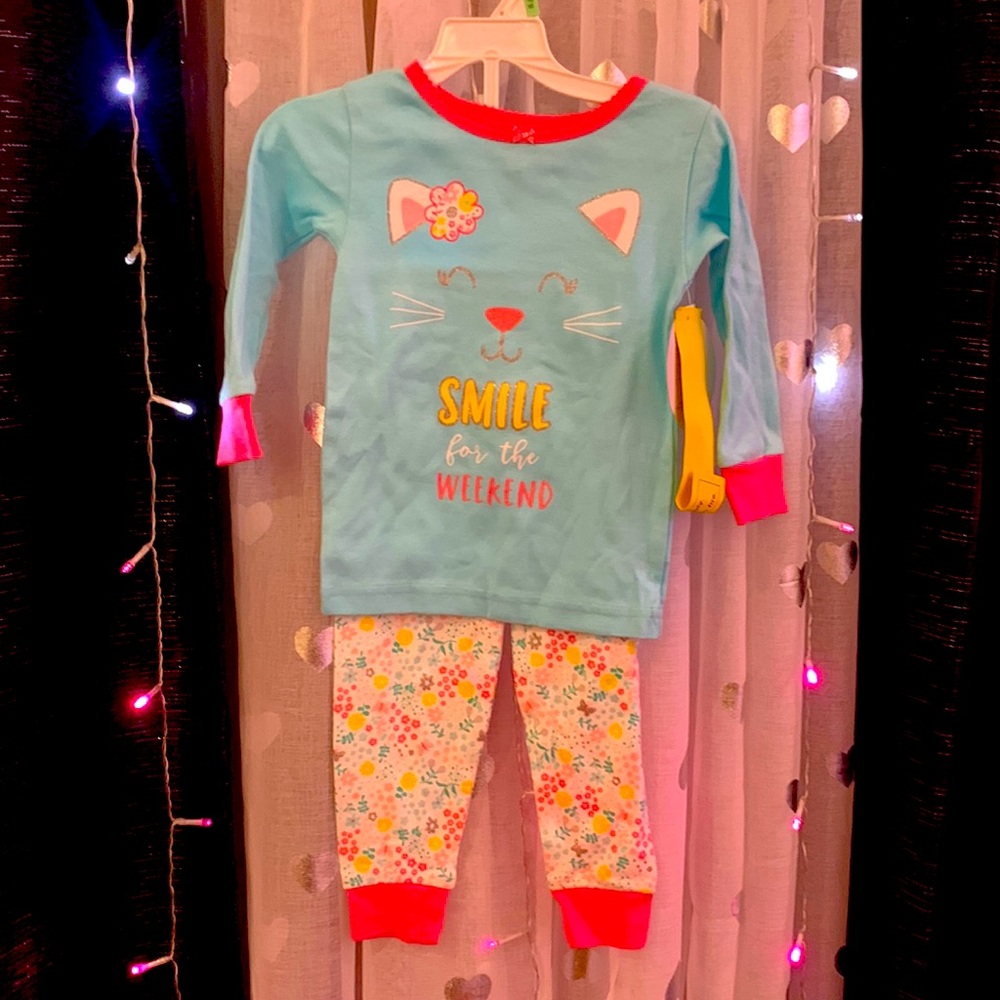 Two piece long sleeve and pants set for a little girl